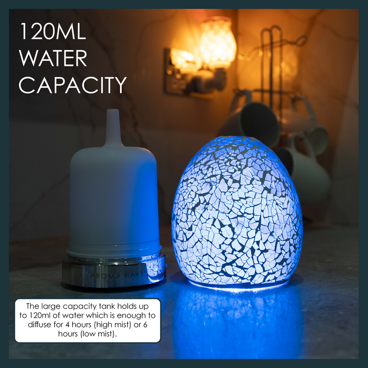 Aroma diffuser with 120ml water capacity, blue design, and high/low mist settings for up to 6 hours.