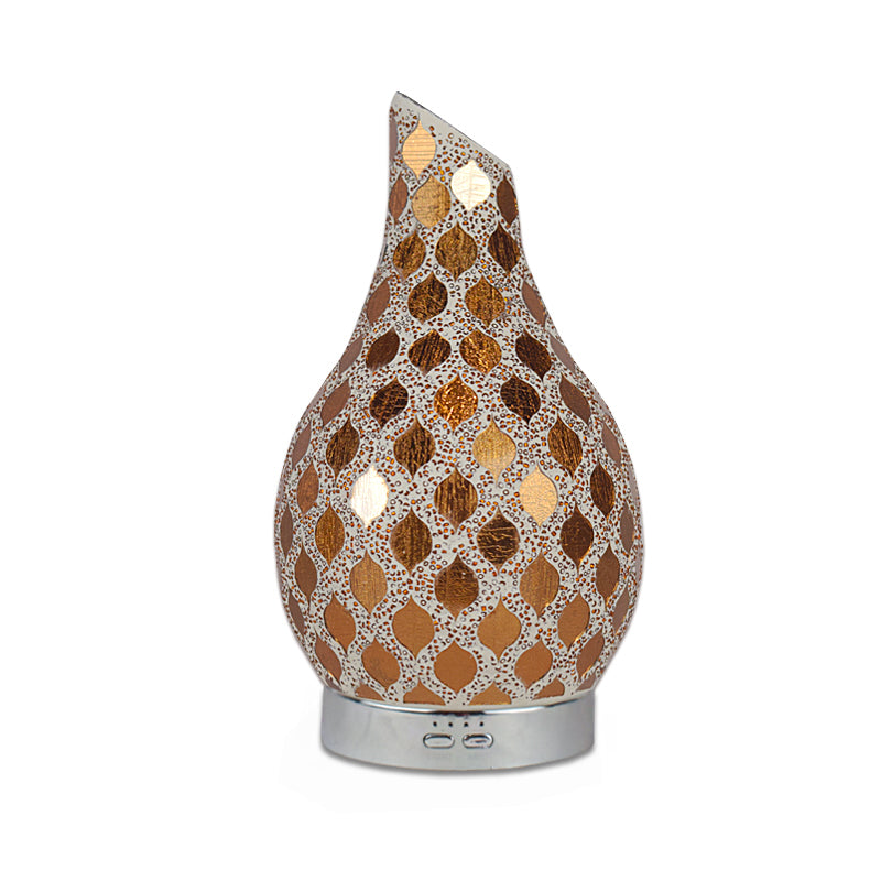 Electric aroma diffuser with a decorative mosaic design, combining style and function for home fragrance.